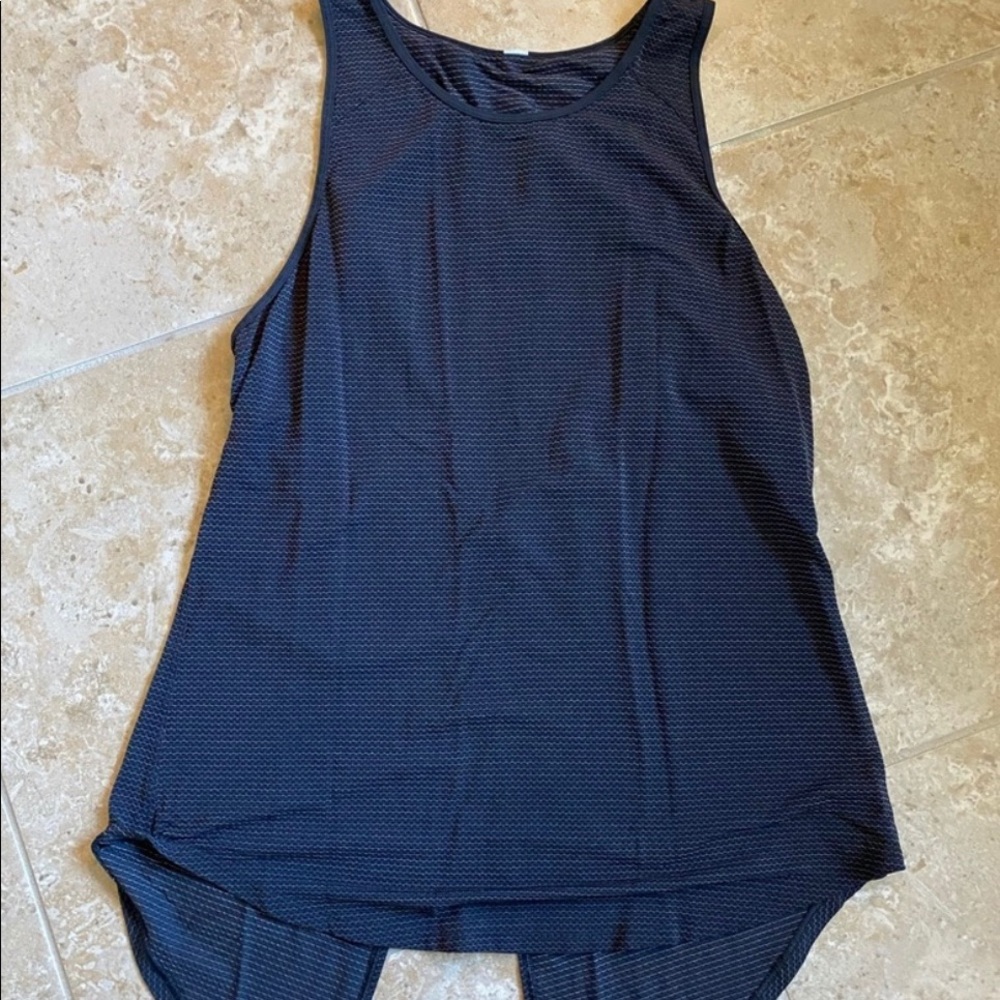Lululemon black tank top. Split back